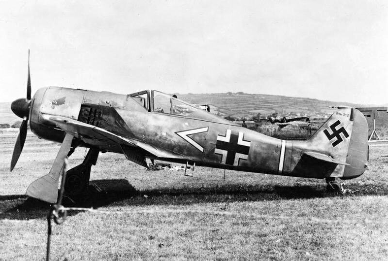 A Focke-Wulf Fw 190 A-3 of JG 2 in German markings standing on grass in England after its pilot landed by mistake in June 1942.