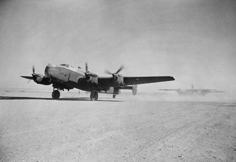 A Halifax glider tug of No. 295 Squadron beginning its take-off run at Goubrine, Tunisia, in 1943 with an Airspeed Horsa glider on tow behind it.